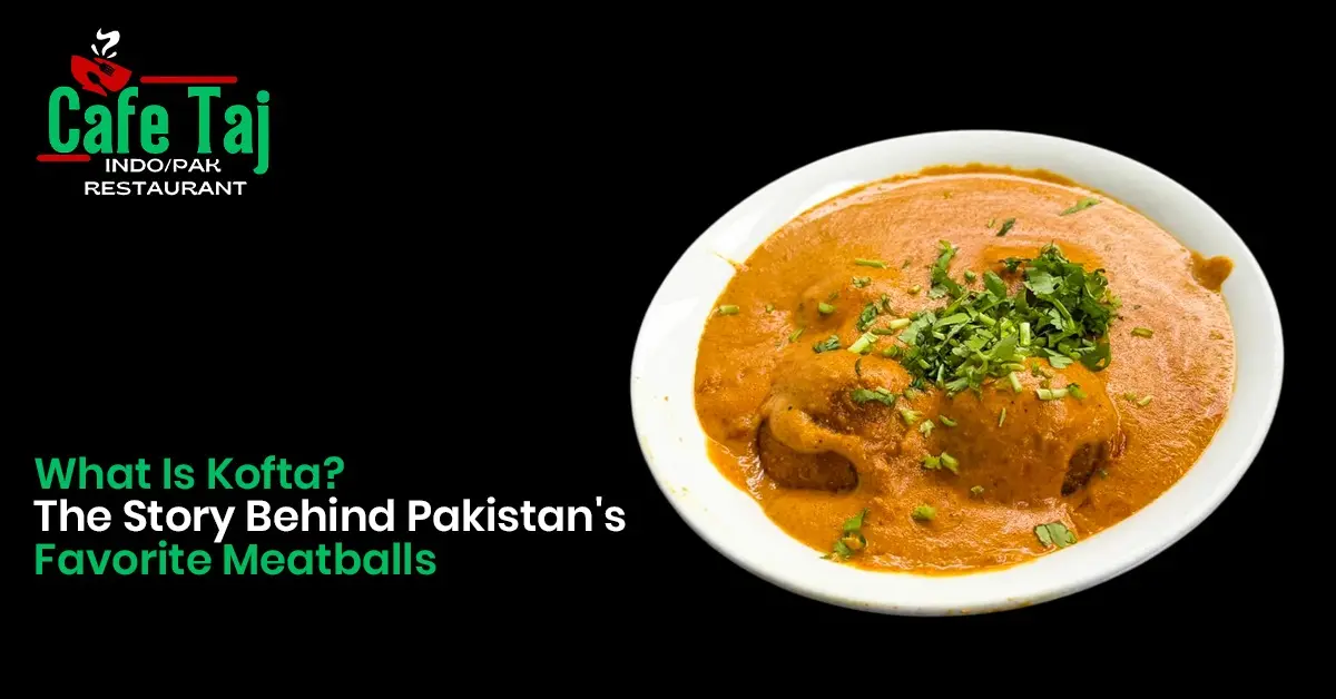 Cafe Taj Kofta curry featuring Pakistani-style meatballs in a rich, creamy gravy, garnished with fresh herbs.