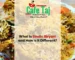 Cafe Taj Sindhi Biryani featuring aromatic basmati rice, tender meat and traditional spices in a colorful Pakistani dish.