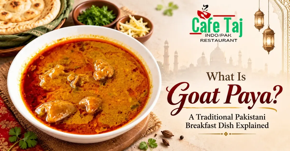 Cafe Taj Goat Paya featuring tender goat trotters in rich, spiced Pakistani curry gravy, served with traditional naan bread.