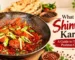 Traditional Shinwari Karahi with tender meat, green chilies, ginger, and spices, featured in Cafe Taj's Pakistani food guide.